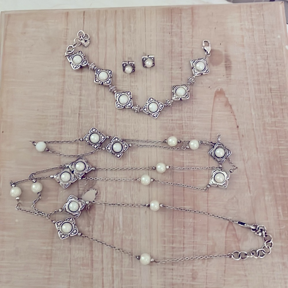 Brighton set includes long necklace, bracelet and earrings.